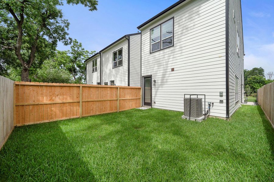 Exterior details and patio area of a home in , Houston (Image 3).