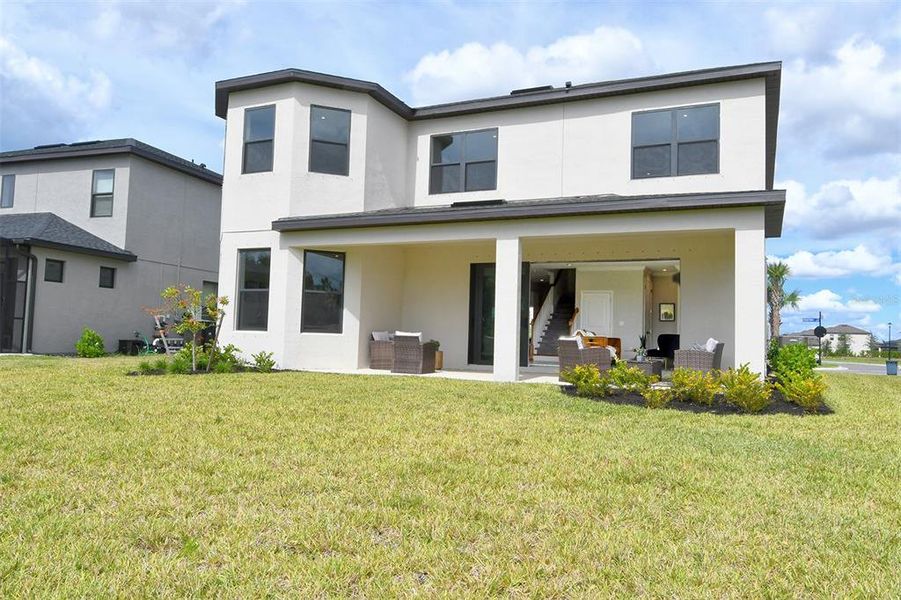 Front exterior of a new home in , Nokomis, FL, highlighting curb appeal (Image 24).