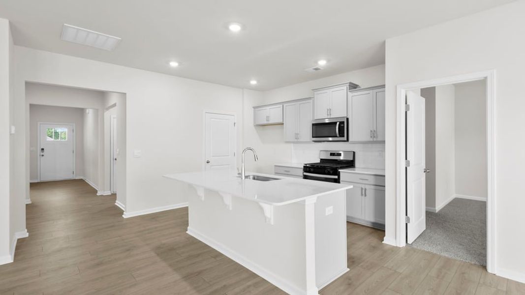Furnished interior view inside a new home in Durbin Meadows Traditions, Fountain Inn (Image 6).