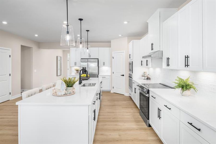 Representative furnished interior of a home built from the Oak Park by Ryan Homes in Arborvale, Fayetteville (Image 5).