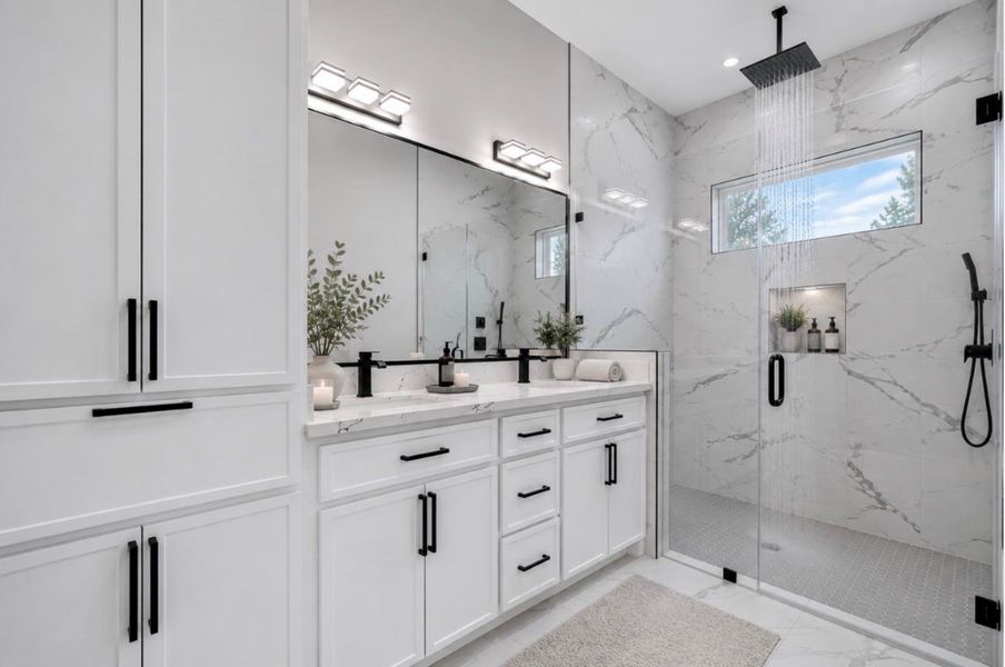 The primary en suite, intentionally made. with a convenient built-in laundry area. The primary en suite, intentionally made. with a convenient built-in laundry area.
