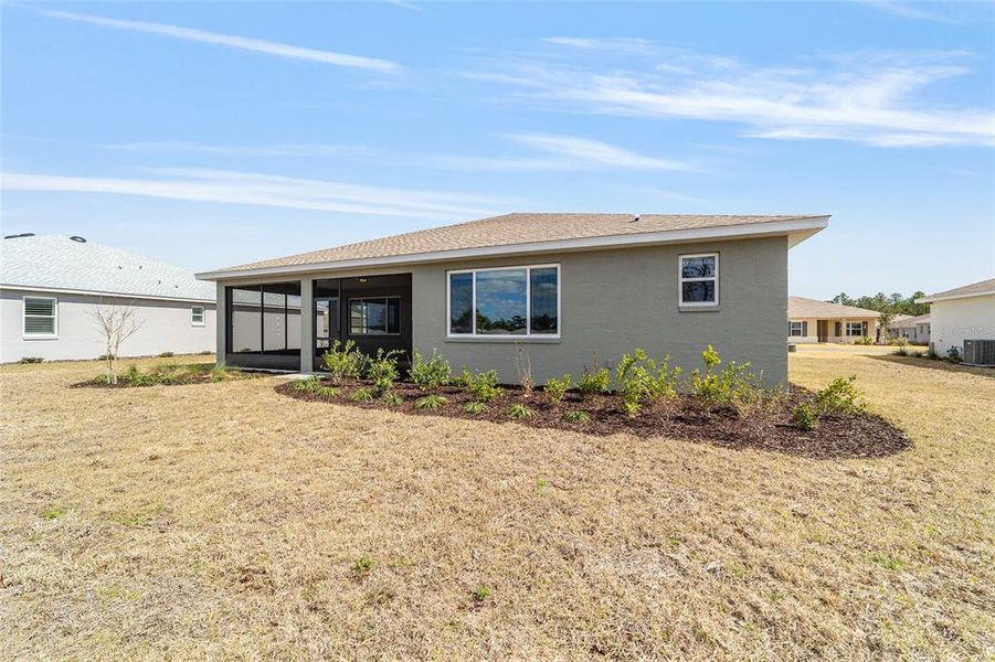 Exterior details and patio area of a home in On Top of the World Communities, Ocala (Image 4).