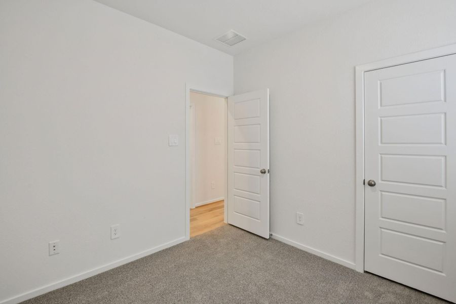 Spacious, unfurnished interior of a new home in Sanford Farms - Traditional Series, Waller (Image 37).