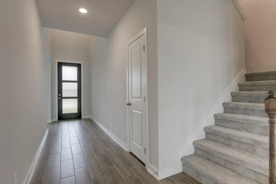 Representative unfurnished interior of a home built from the Guadalupe by Ashton Woods in Saddlebrook Ranch, Schertz (Image 18).