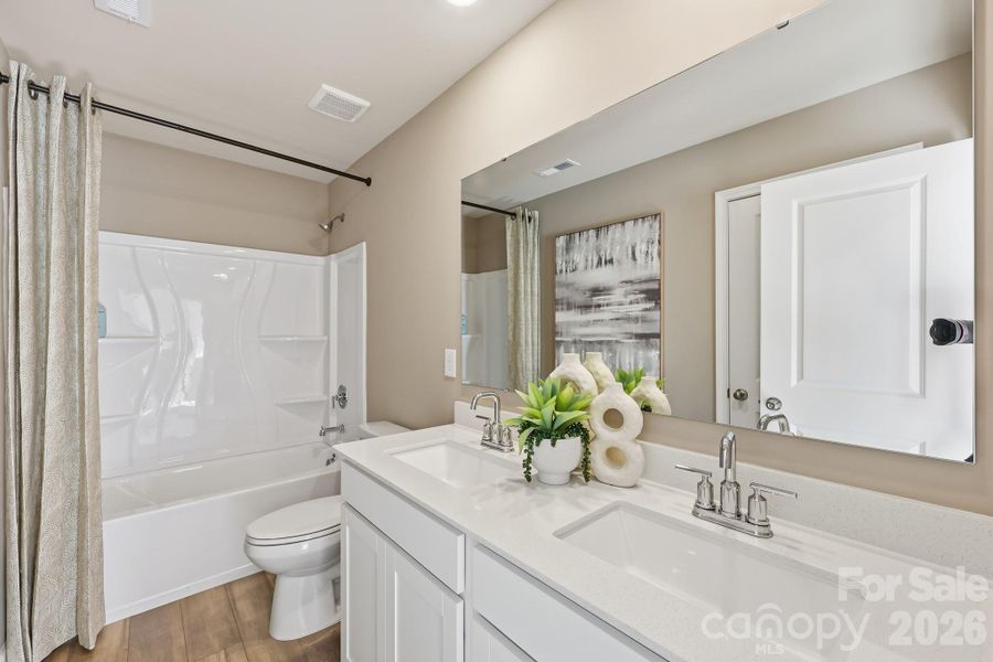 Upstairs full bathPhoto is representational. Actual colors may vary Upstairs full bathPhoto is representational. Actual colors may vary