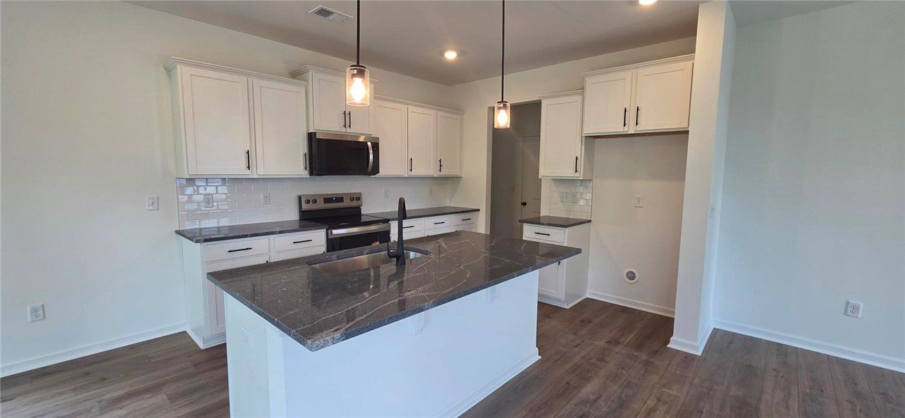 Furnished interior view inside a new home in Brownstone Park, Easley (Image 3).