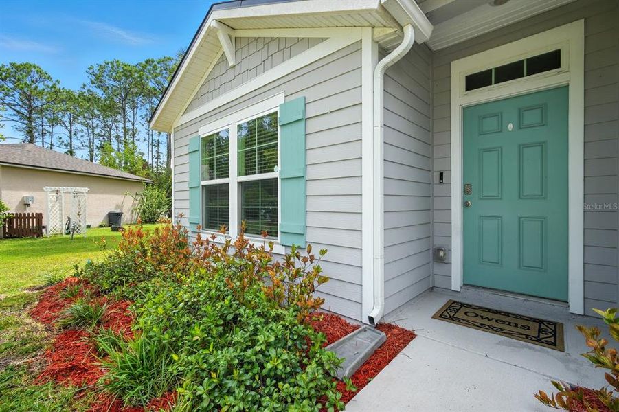 Front exterior of a new home in Palm Coast Homesites, Palm Coast, FL, highlighting curb appeal (Image 22).