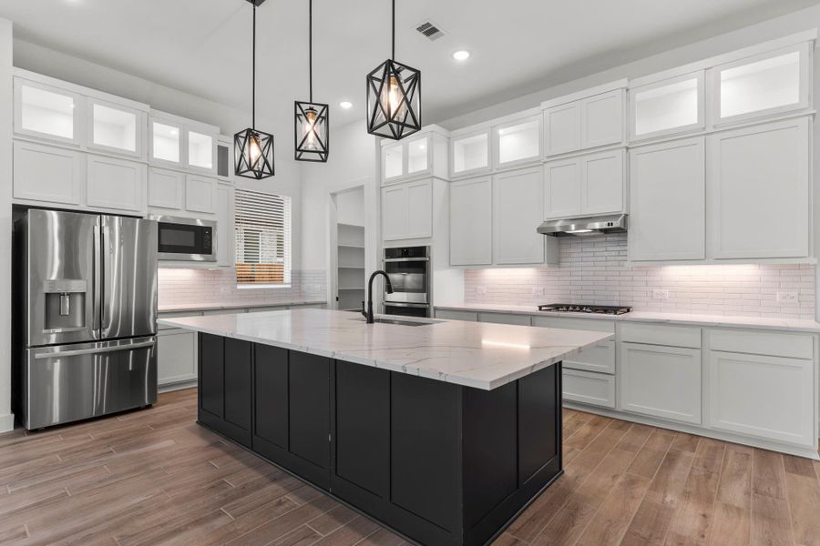 Furnished interior view inside a new home in Blue Heron, Mont Belvieu (Image 6).