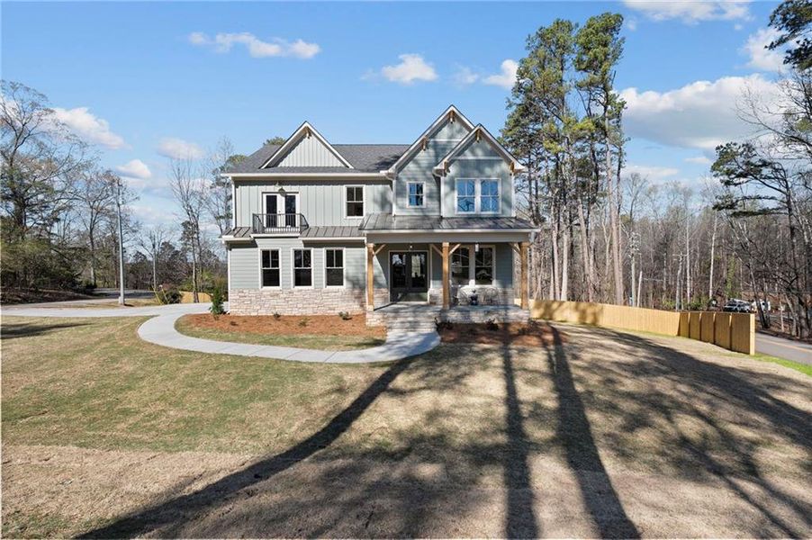 Front exterior of a new home in , Cumming, GA, highlighting curb appeal (Image 29).