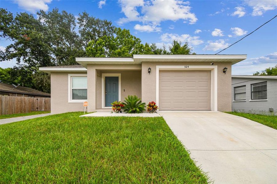 Front exterior of a new home in , Lakeland, FL, highlighting curb appeal (Image 1). Front exterior of a new home in , Lakeland, FL, highlighting curb appeal (Image 1).