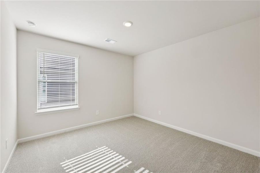 Spacious, unfurnished interior of a new home in Westmont Preserve, Powder Springs (Image 21).