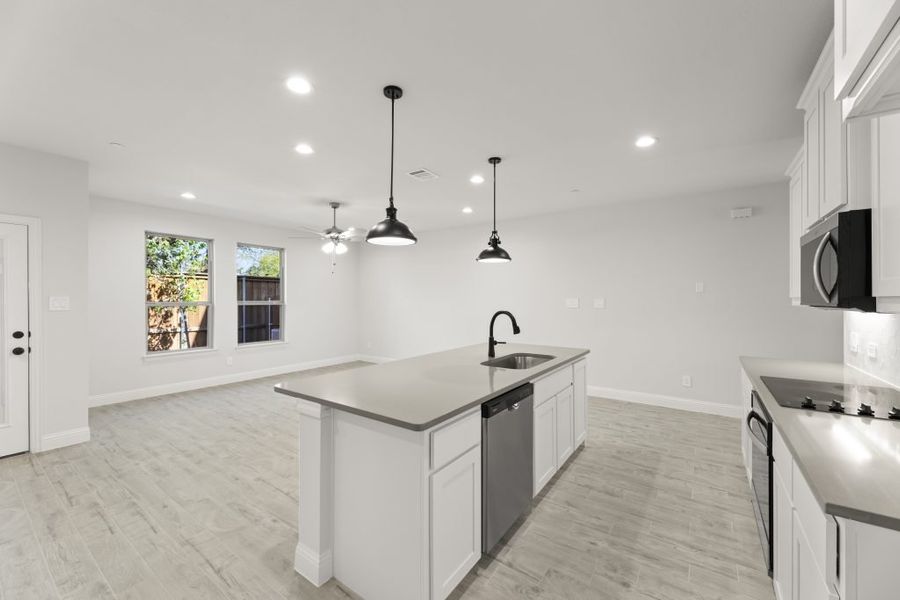 Front exterior of a new home in Sereno Oaks at Buckner Terrace, Dallas, TX, highlighting curb appeal (Image 9). Front exterior of a new home in Sereno Oaks at Buckner Terrace, Dallas, TX, highlighting curb appeal (Image 9).