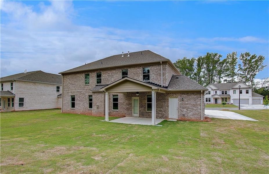 Exterior details and patio area of a home in Cambria at Traditions, Hampton (Image 3).