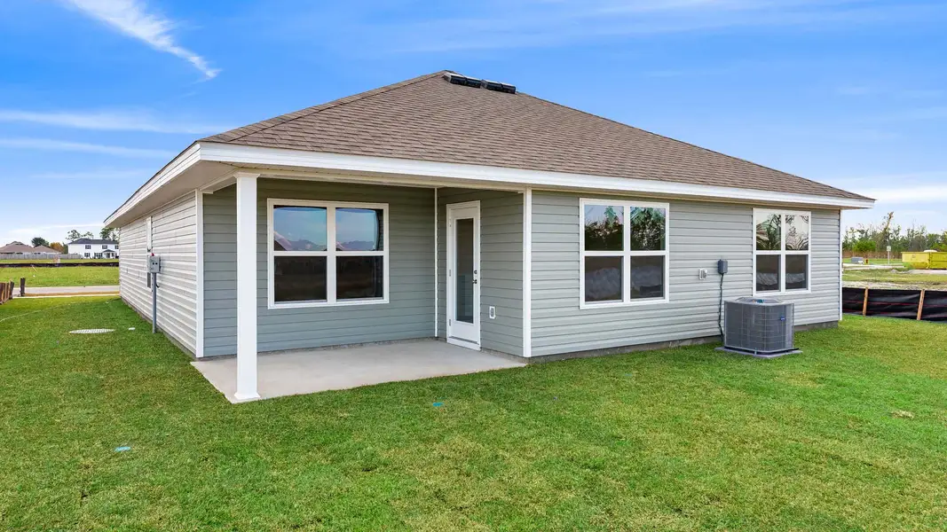 Exterior details and patio area of a home in Hodges Bayou Plantation, Panama City (Image 4).