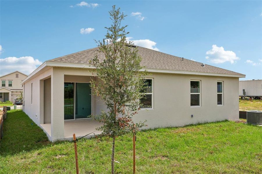 Exterior details and patio area of a home in Park View at the Hills, Minneola (Image 17). Exterior details and patio area of a home in Park View at the Hills, Minneola (Image 17).