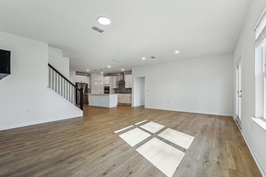 Representative unfurnished interior of a home built from the Macon by Ashton Woods in Rowland's Grant, Fuquay Varina (Image 20).
