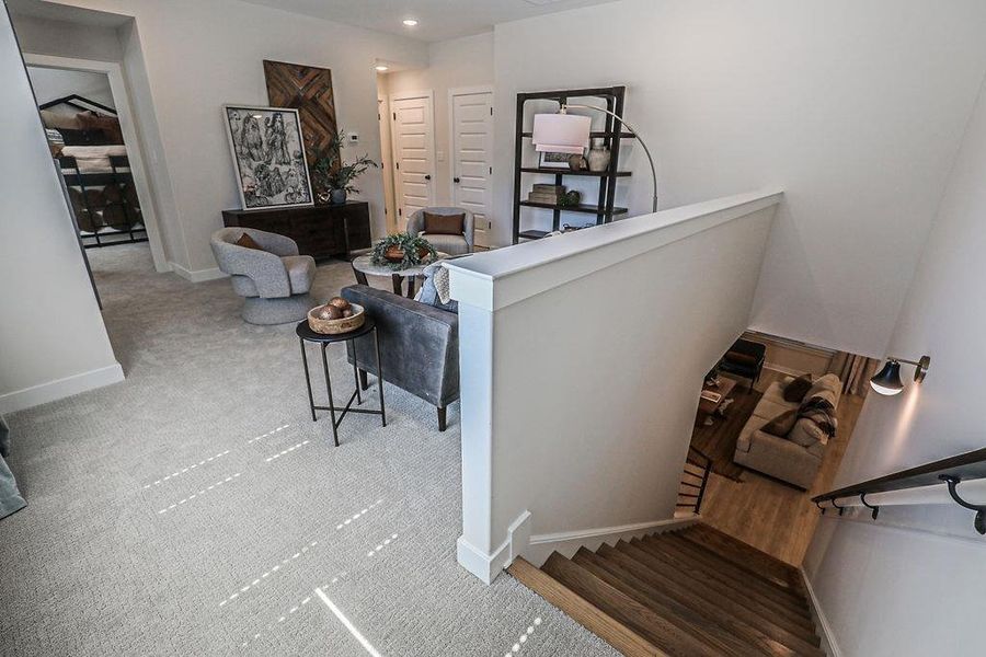 Stairs featuring carpet flooring and recessed lighting