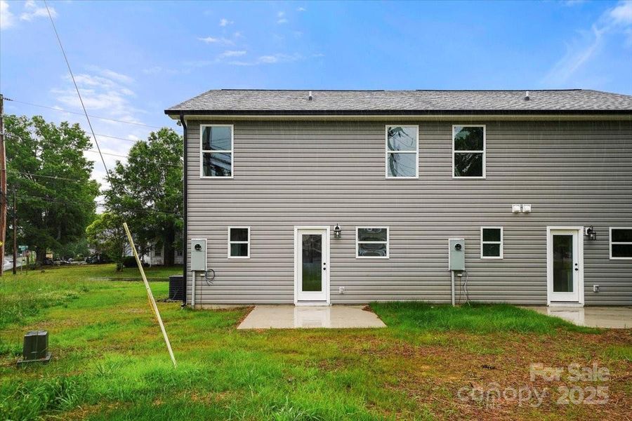 Front exterior of a new home in , Albemarle, NC, highlighting curb appeal (Image 1).