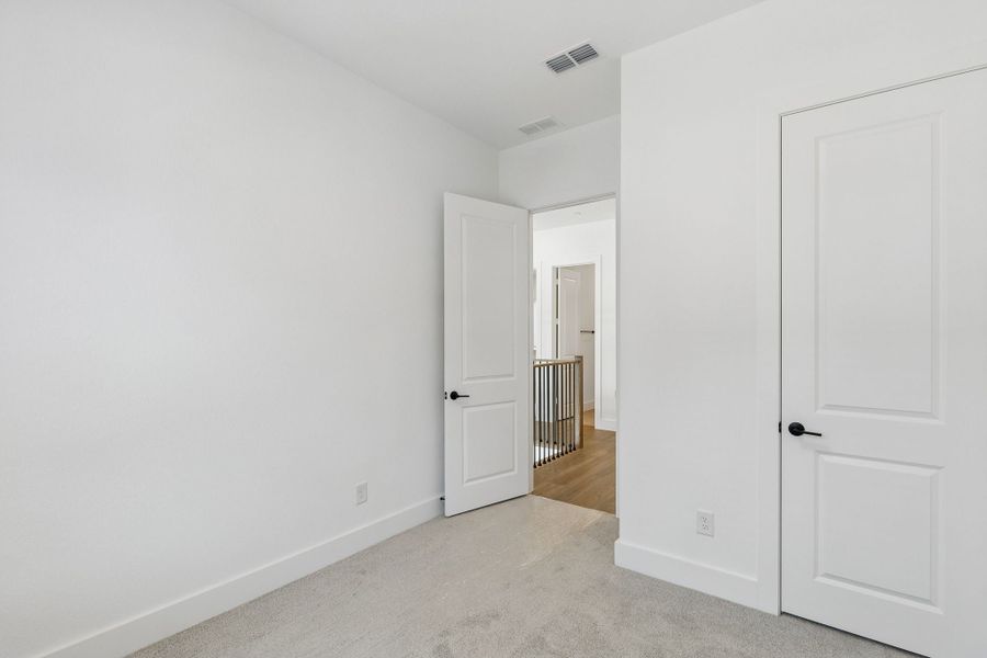 Representative unfurnished interior of a home built from the Roosevelt by Centre Living Homes in Newman Village Townhomes, Frisco (Image 23).