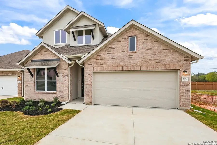 Front exterior of a new home in Sunflower Ridge, New Braunfels, TX, highlighting curb appeal (Image 2).