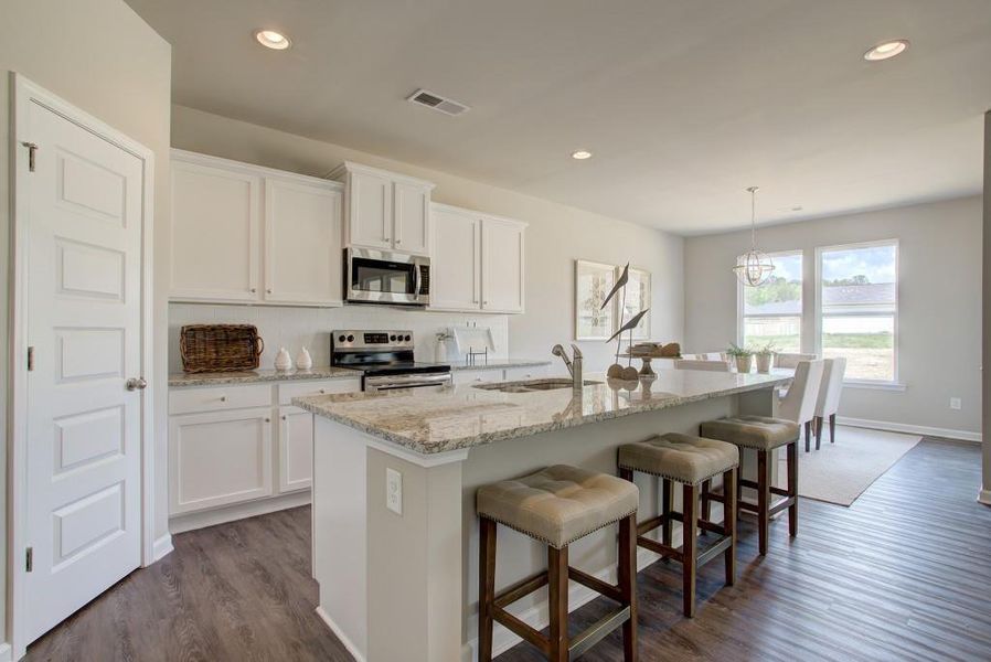 Furnished interior view inside a new home in Sutton's Landing, Statham (Image 8).