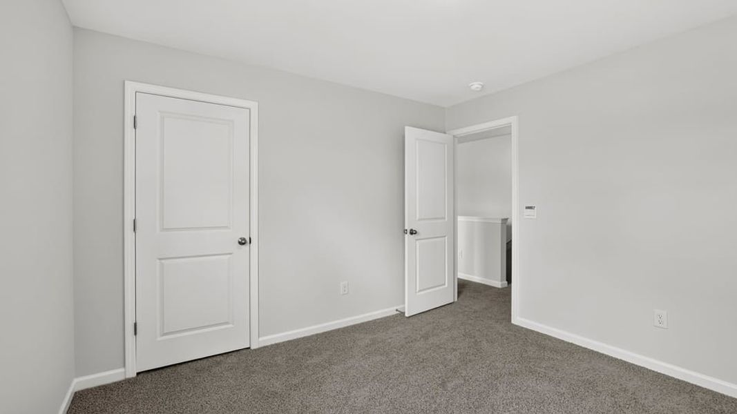 Spacious, unfurnished interior of a new home in Bentley Park, Greenwood (Image 30). Spacious, unfurnished interior of a new home in Bentley Park, Greenwood (Image 30).