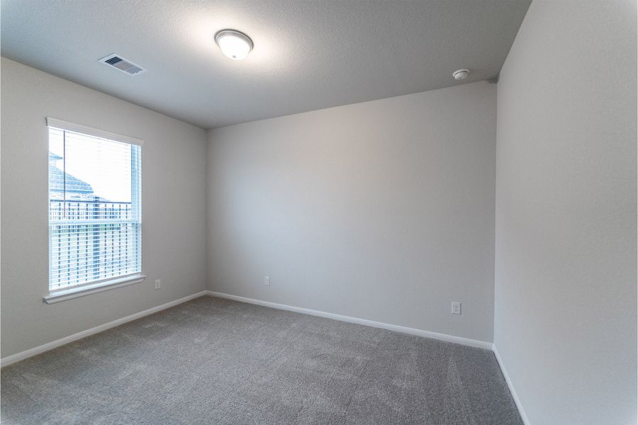 Spacious, unfurnished interior of a new home in Canterra Creek, Rosharon (Image 25).