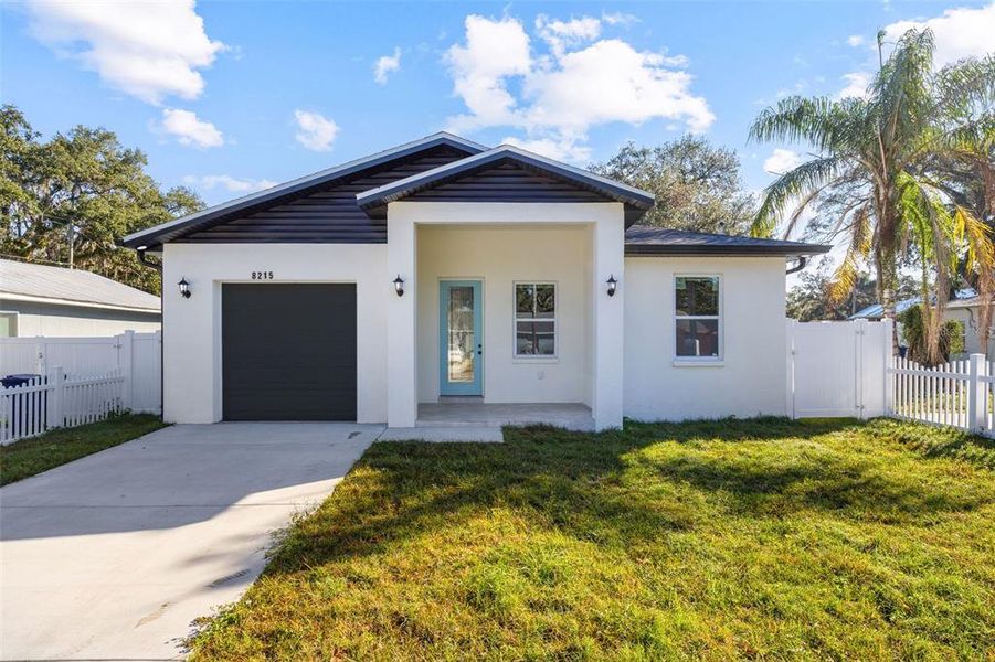 Front exterior of a new home in , Tampa, FL, highlighting curb appeal (Image 21).