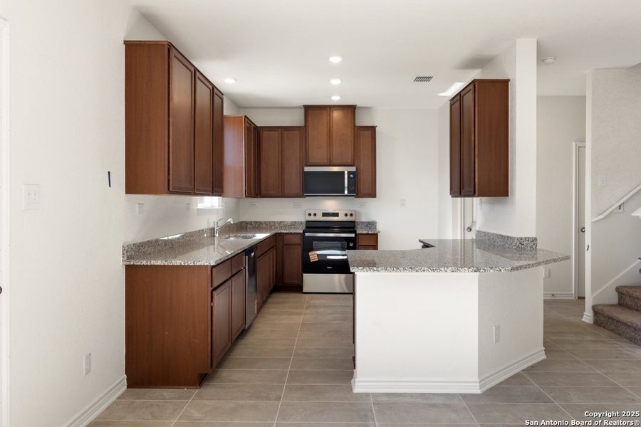 Furnished interior view inside a new home in The Granary - Heritage Collection, San Antonio (Image 6).
