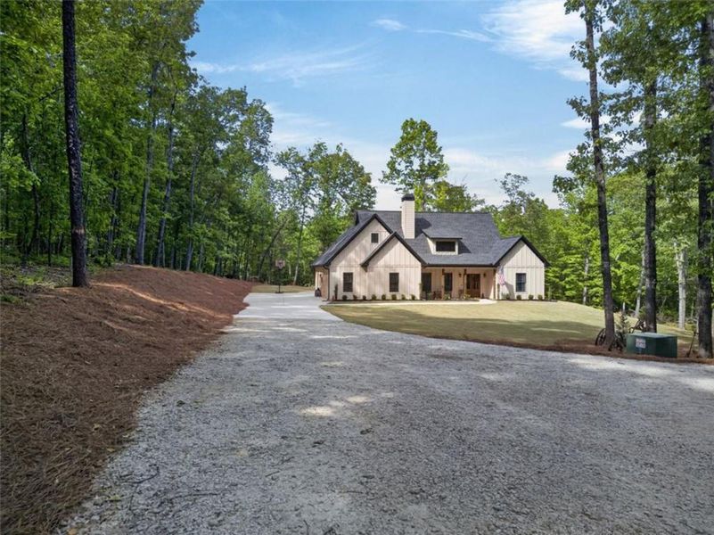 Front exterior of a new home in , Winston, GA, highlighting curb appeal (Image 21). Front exterior of a new home in , Winston, GA, highlighting curb appeal (Image 21).