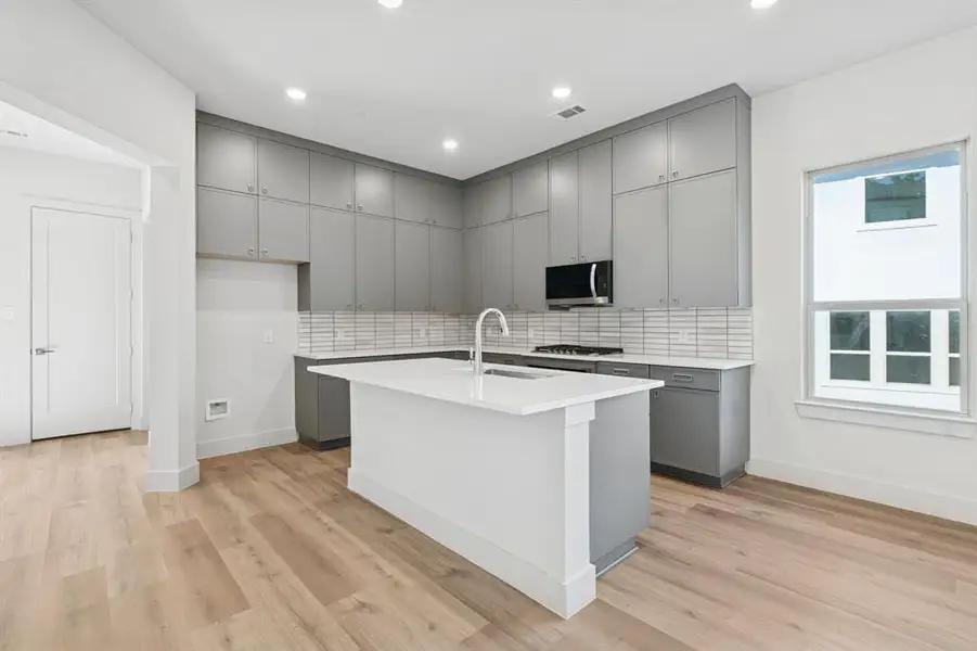 Kitchen with tons of storage space.