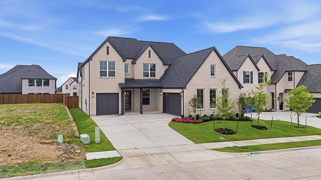 Front exterior of a new home in The Homestead - 62', Rockwall, TX, highlighting curb appeal (Image 24).