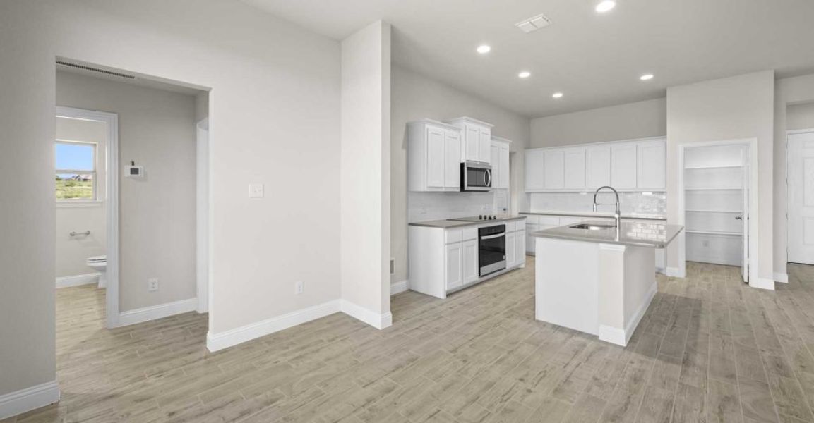 Representative exterior photo of a completed home built from the Alderbury by Impression Homes in Timberbrook, Justin, TX (Image 12).