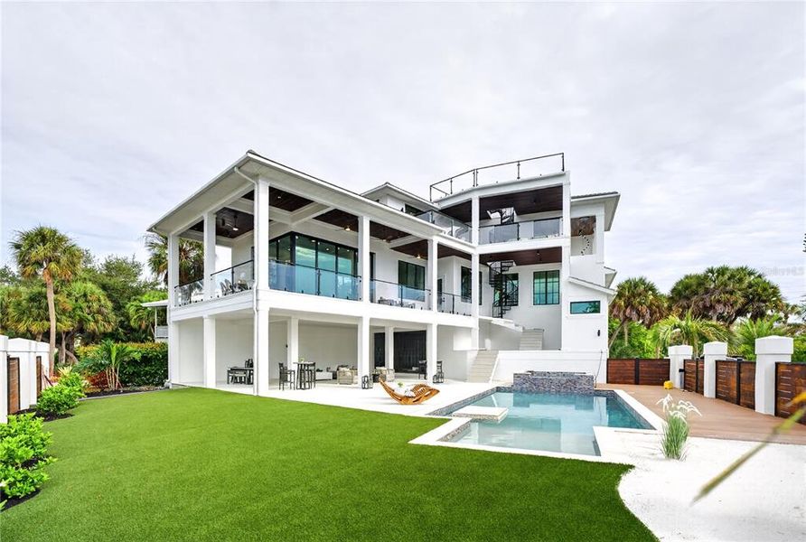 Exterior details and patio area of a home in , Sarasota (Image 35).