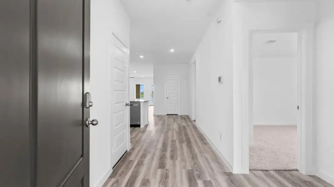 Spacious, unfurnished interior of a new home in Lago Mar 60' Homesites, Texas City (Image 10). Spacious, unfurnished interior of a new home in Lago Mar 60' Homesites, Texas City (Image 10).