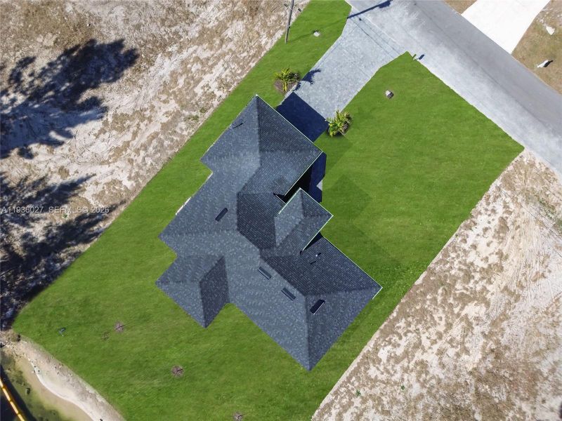 Front exterior of a new home in , Cape Coral, FL, highlighting curb appeal (Image 20).