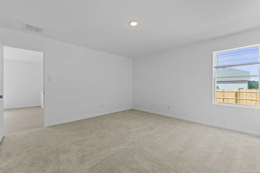 Spacious, unfurnished interior of a new home in Hidden Oasis, San Antonio (Image 21).