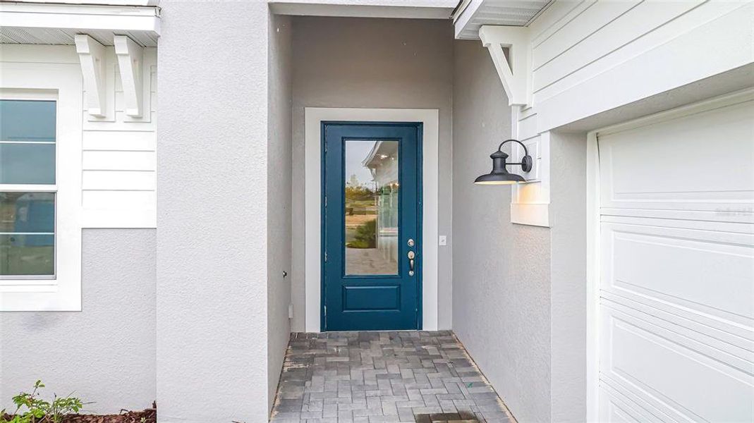 Exterior details and patio area of a home in Cresswind at Hammock Oaks, Lady Lake (Image 1).