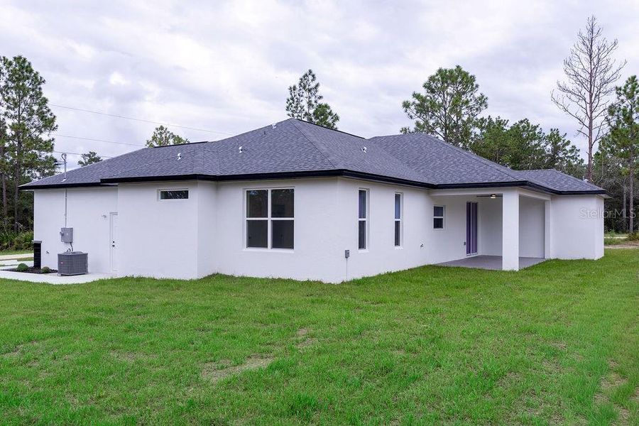 Front exterior of a new home in , Dunnellon, FL, highlighting curb appeal (Image 36). Front exterior of a new home in , Dunnellon, FL, highlighting curb appeal (Image 36).