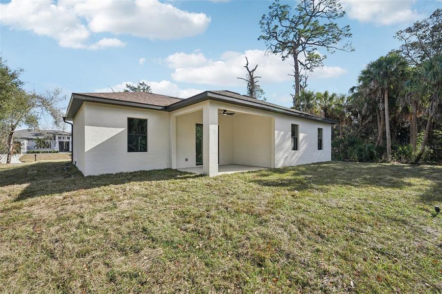 Exterior details and patio area of a home in , North Port (Image 4).