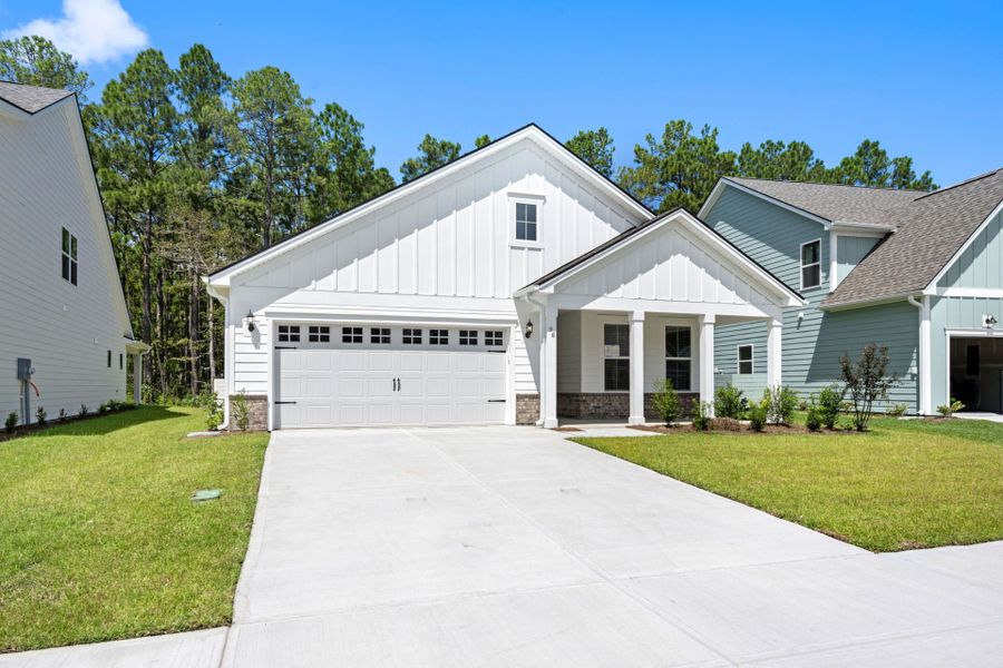 Front exterior of a new home in Waterways, Richmond Hill, GA, highlighting curb appeal (Image 28).