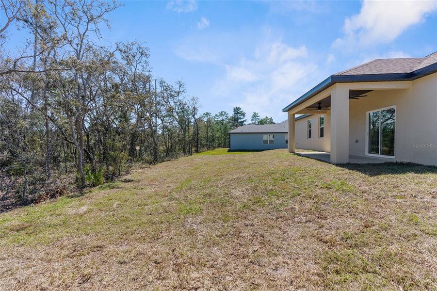 Front exterior of a new home in , Homosassa, FL, highlighting curb appeal (Image 1). Front exterior of a new home in , Homosassa, FL, highlighting curb appeal (Image 1).