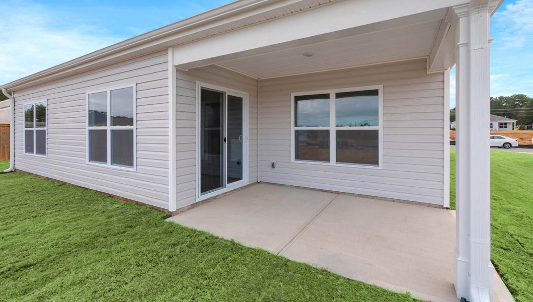 Exterior details and patio area of a home in Lightwood Cottages, Moore (Image 3).