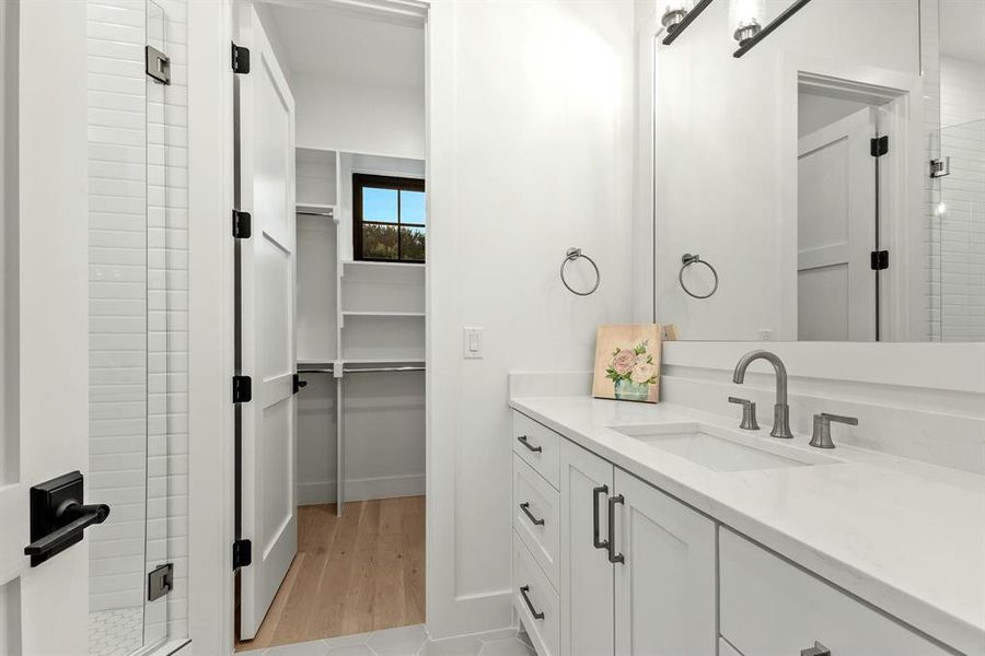 Walk in closet and ensuite bath Walk in closet and ensuite bath