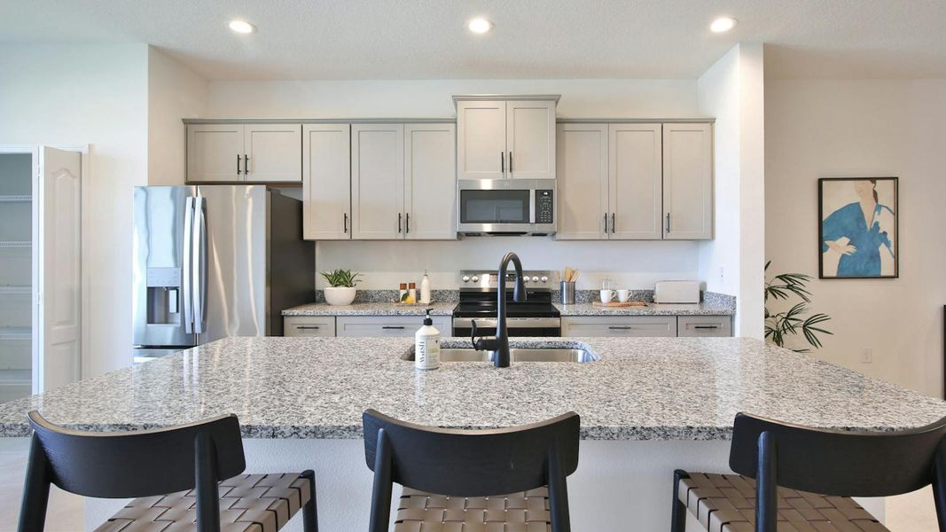 Furnished interior view inside a new home in Palm Grove Real Estate and Homes for Sale in Lakewood Ranch, FL - Neal Communities, Lakewood Ranch (Image 29).