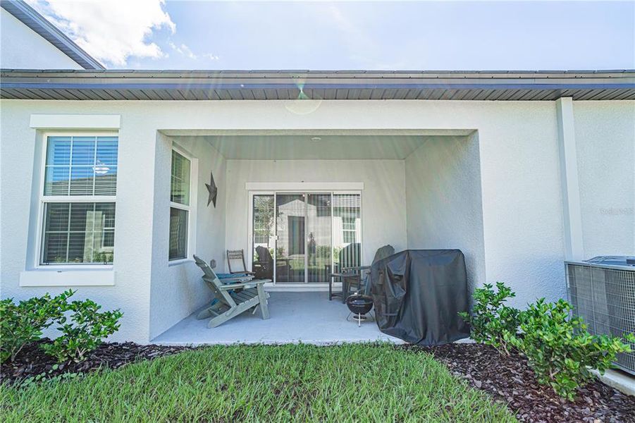 Exterior details and patio area of a home in Angeline Active Adult, Land O' Lakes (Image 19).