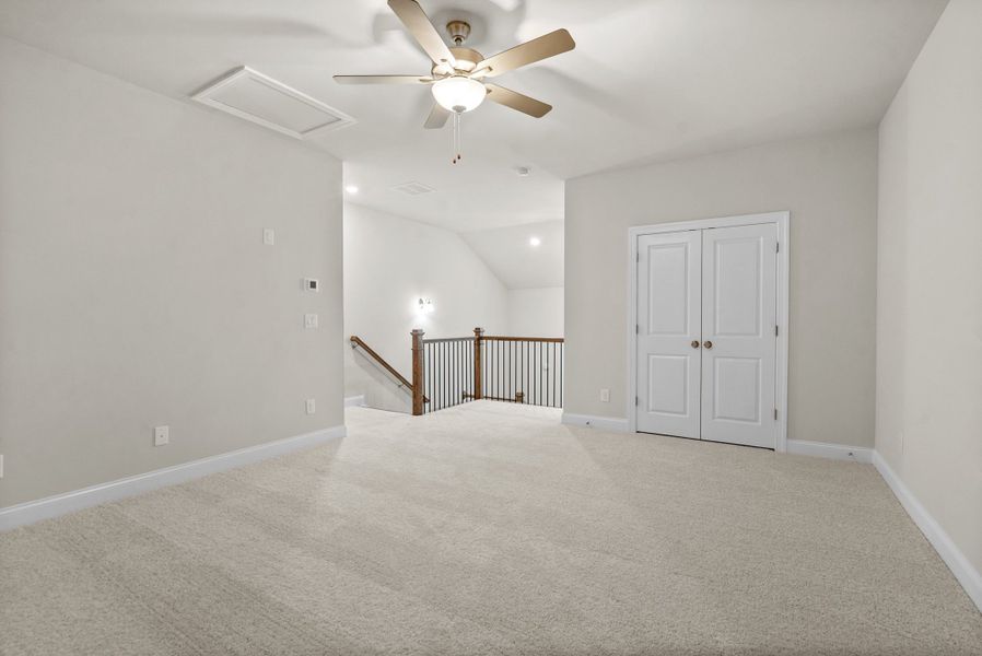 Representative unfurnished interior of a home built from the The McIntosh by The Providence Group in Promenade at Sawnee Village, Cumming (Image 27).