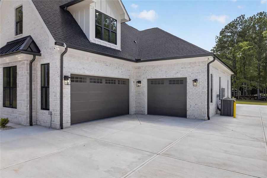 Front exterior of a new home in , Monroe, GA, highlighting curb appeal (Image 34). Front exterior of a new home in , Monroe, GA, highlighting curb appeal (Image 34).