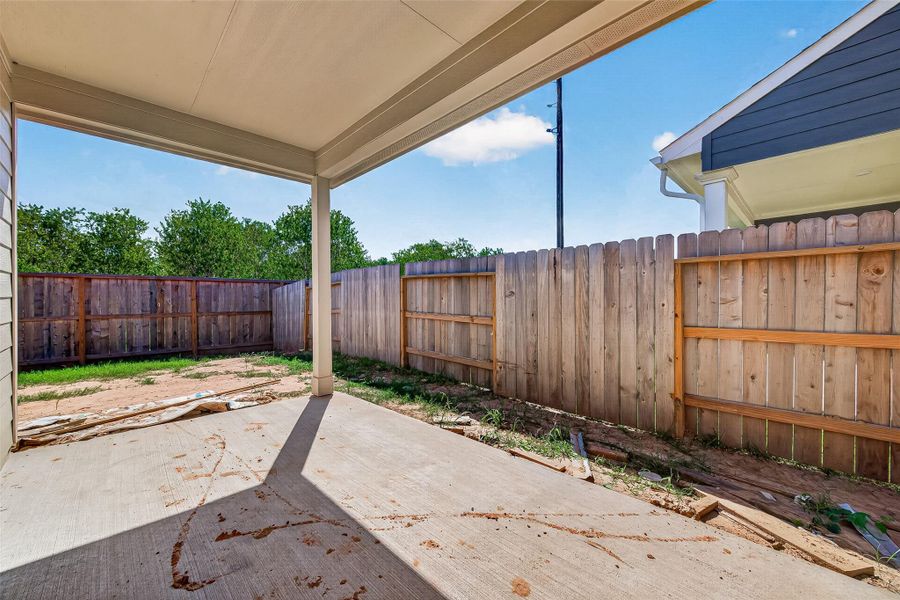 Exterior details and patio area of a home in La Segarra, Brookshire (Image 29).