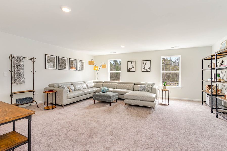 Representative furnished interior of a home built from the WREN by D.R. Horton in Kingston Bay, Conway (Image 30).